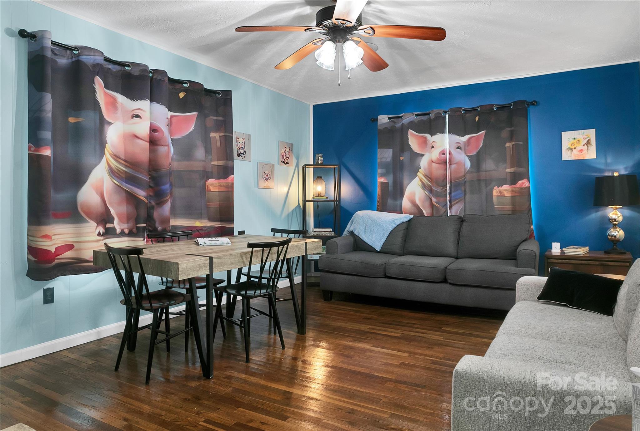 Living Room, decorated with piggies, looking from the hallway. - 626 Fairview Loop, Hot Springs
