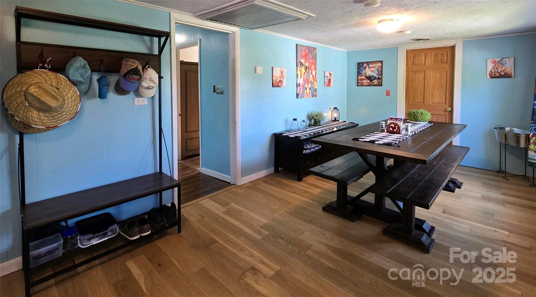 Just inside the back door from the rear deck is a really great room! Entry, Dining, Laundry and entrance into the hallway to the bedrooms and living room. - 626 Fairview Loop, Hot Springs