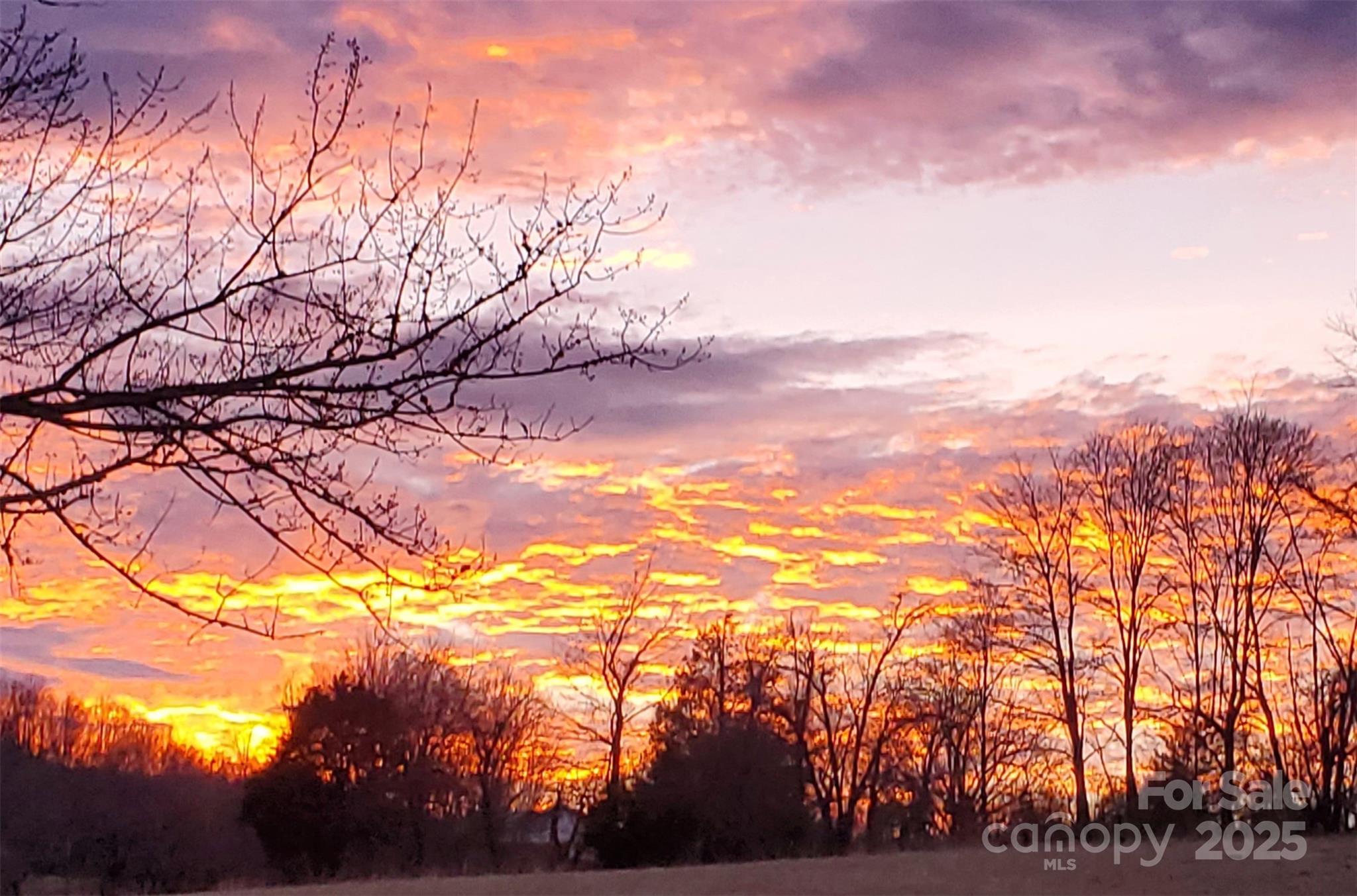 Sunsets are also incredible to the west of the house, from both the front porch and the rear deck / hot tub! - 626 Fairview Loop, Hot Springs