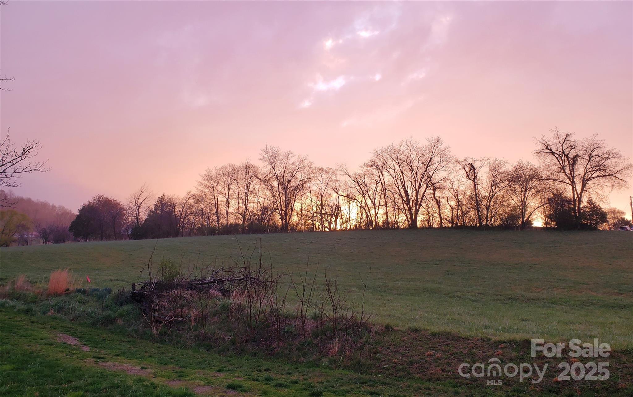 Sunsets are also incredible to the west of the house, from both the front porch and the rear deck / hot tub! - 626 Fairview Loop, Hot Springs