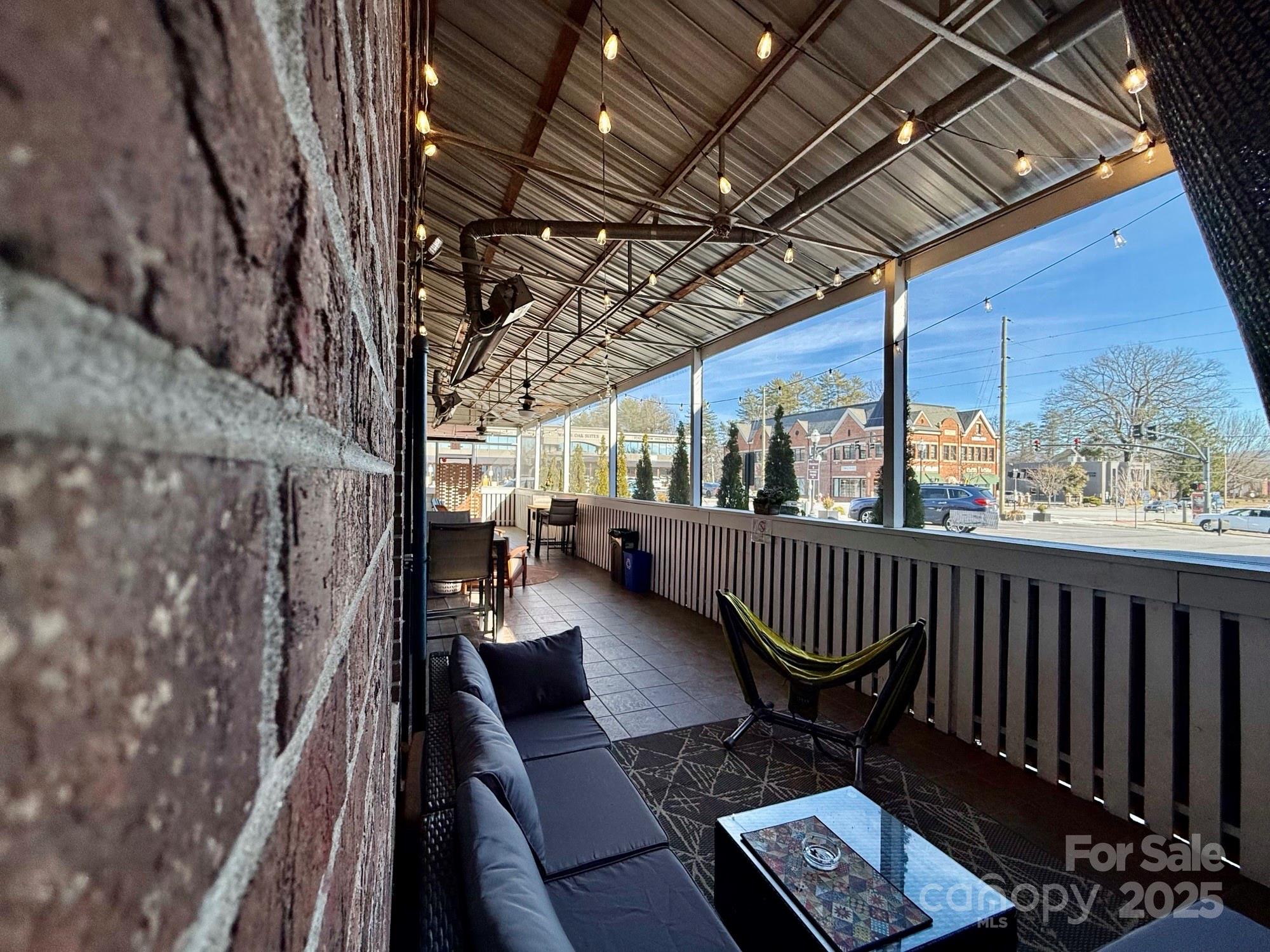 Side Patio to Street - 100 E Main Street, Brevard