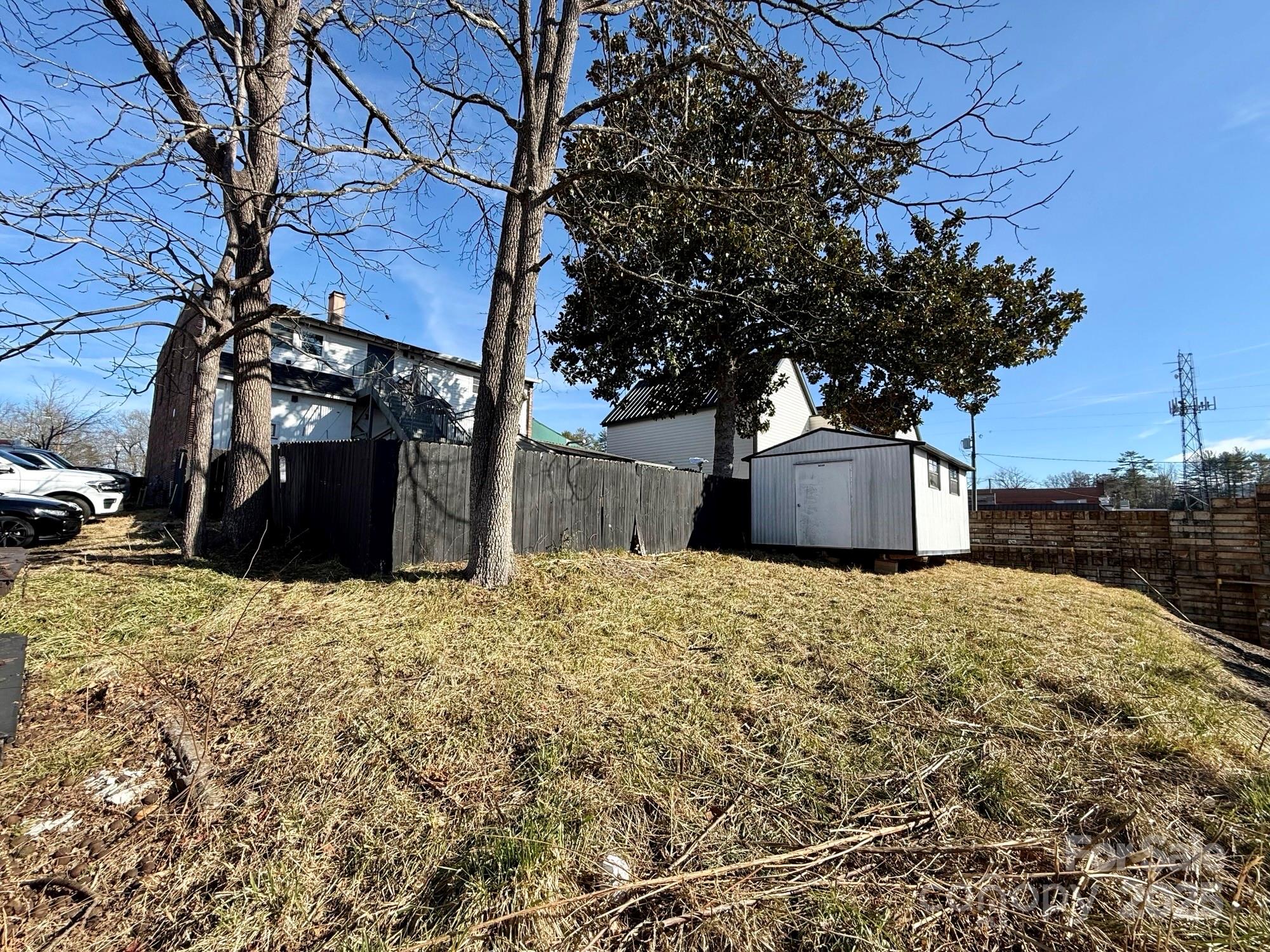 Back of lot beyond fence - 100 E Main Street, Brevard