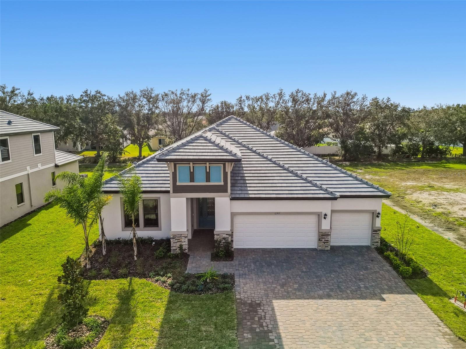Single Family Residence at 12305 WHITE BLOSSOM CT, PARRISH, photo 2 of 11