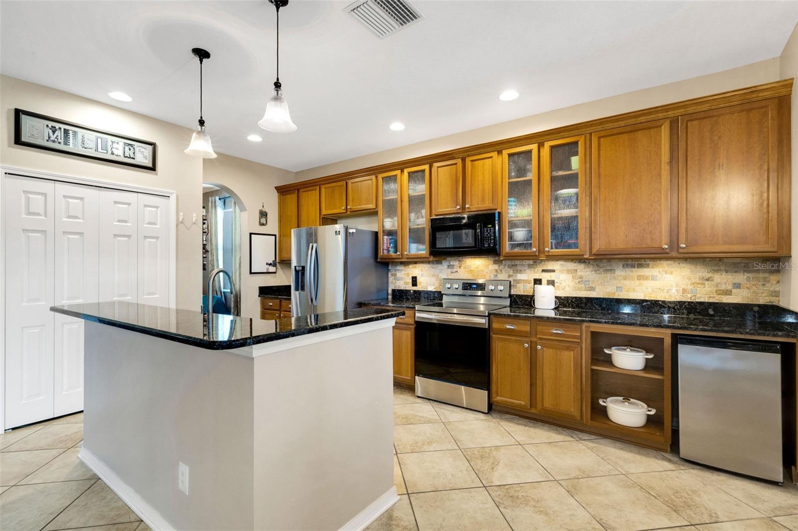 Kitchen Upgrades include 42" Solid Wood cabinets, Labradorite Granite Countertops and breakfast bar island - 5220 119TH TER E, PARRISH