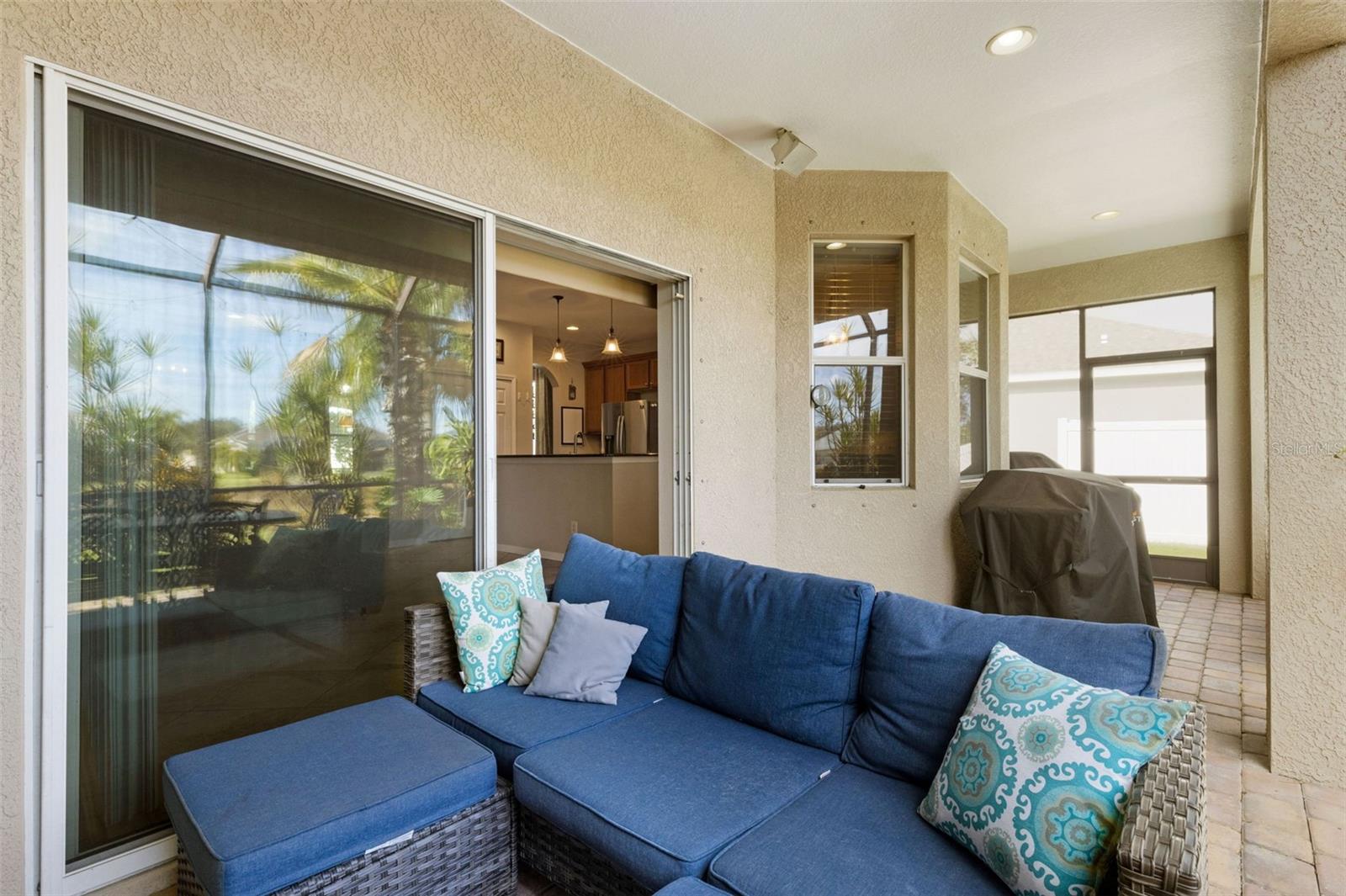 Extended screened lanai with brick pavers and a heated 6-person spa. - 5220 119TH TER E, PARRISH