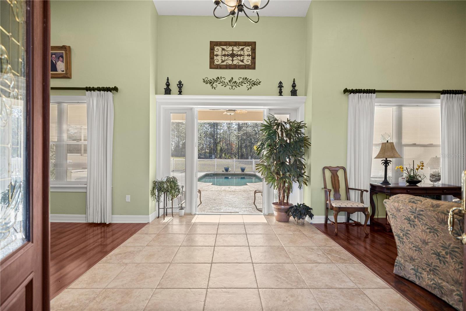Front Entryway leads to pool. - 6081 W PELL PL, DUNNELLON