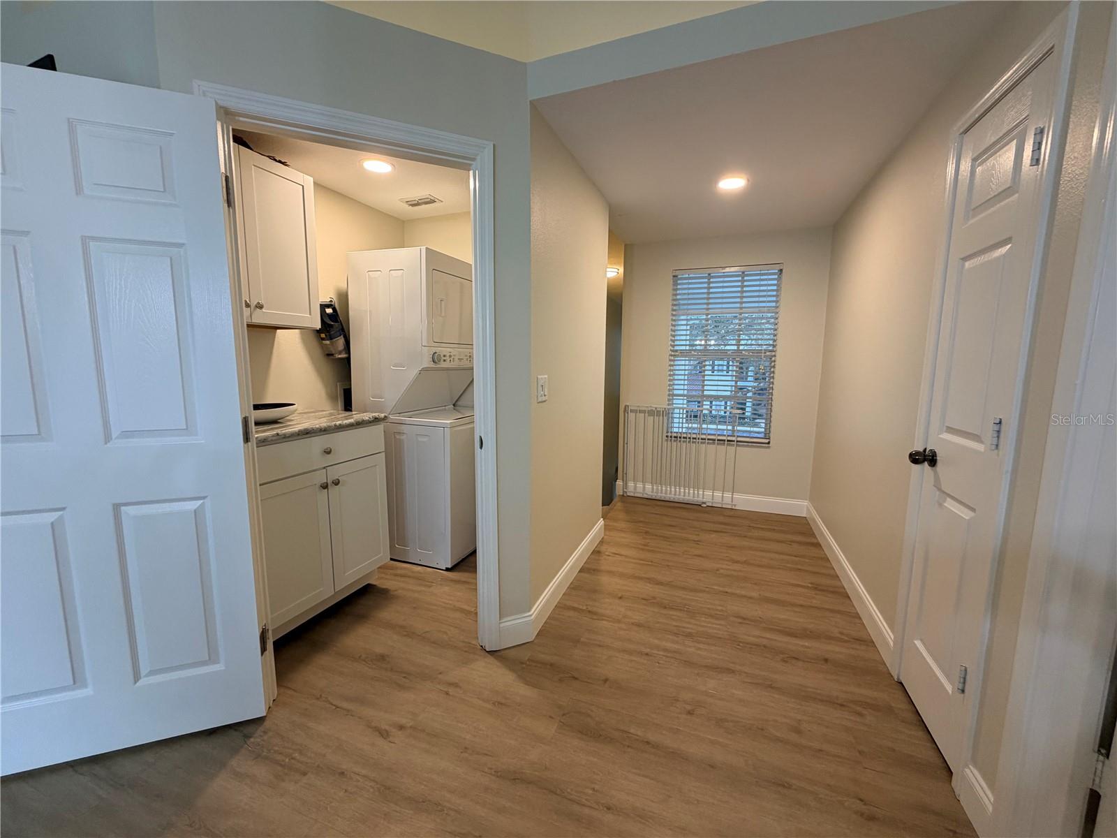 entry way upstairs & laundry room - 10000 SW 52ND AVE #60, GAINESVILLE