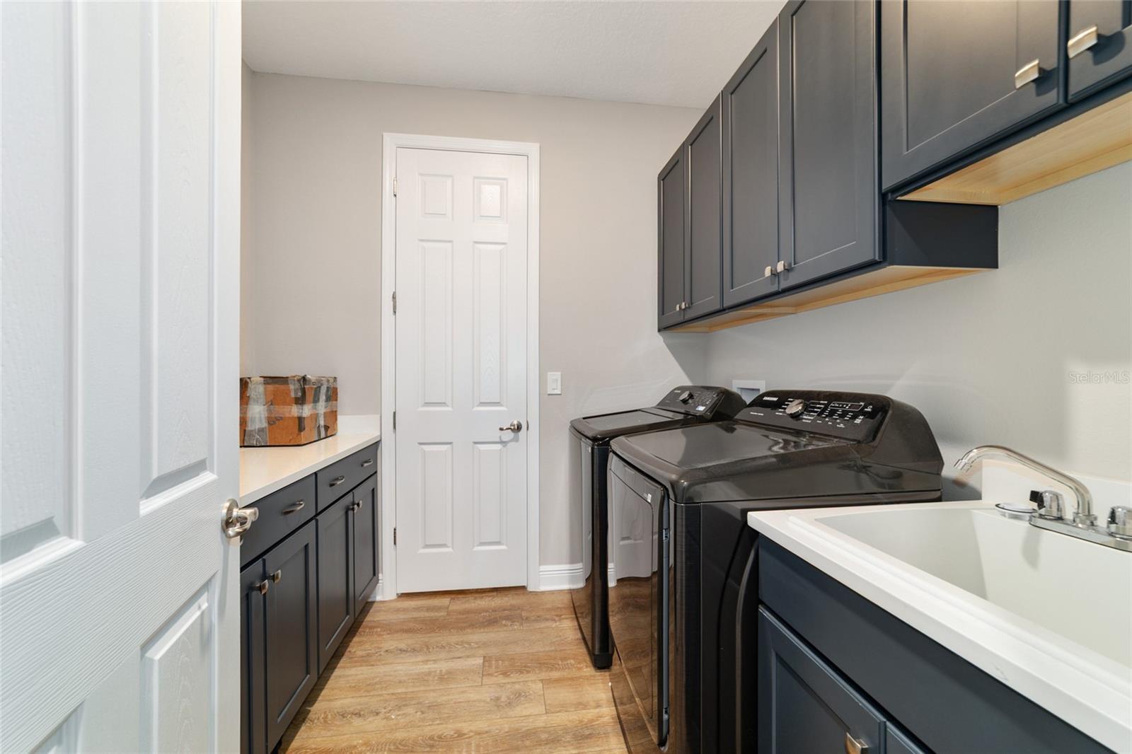 Extra cabinets in Laundry and utility sink - 10453 SW 99TH LN, OCALA