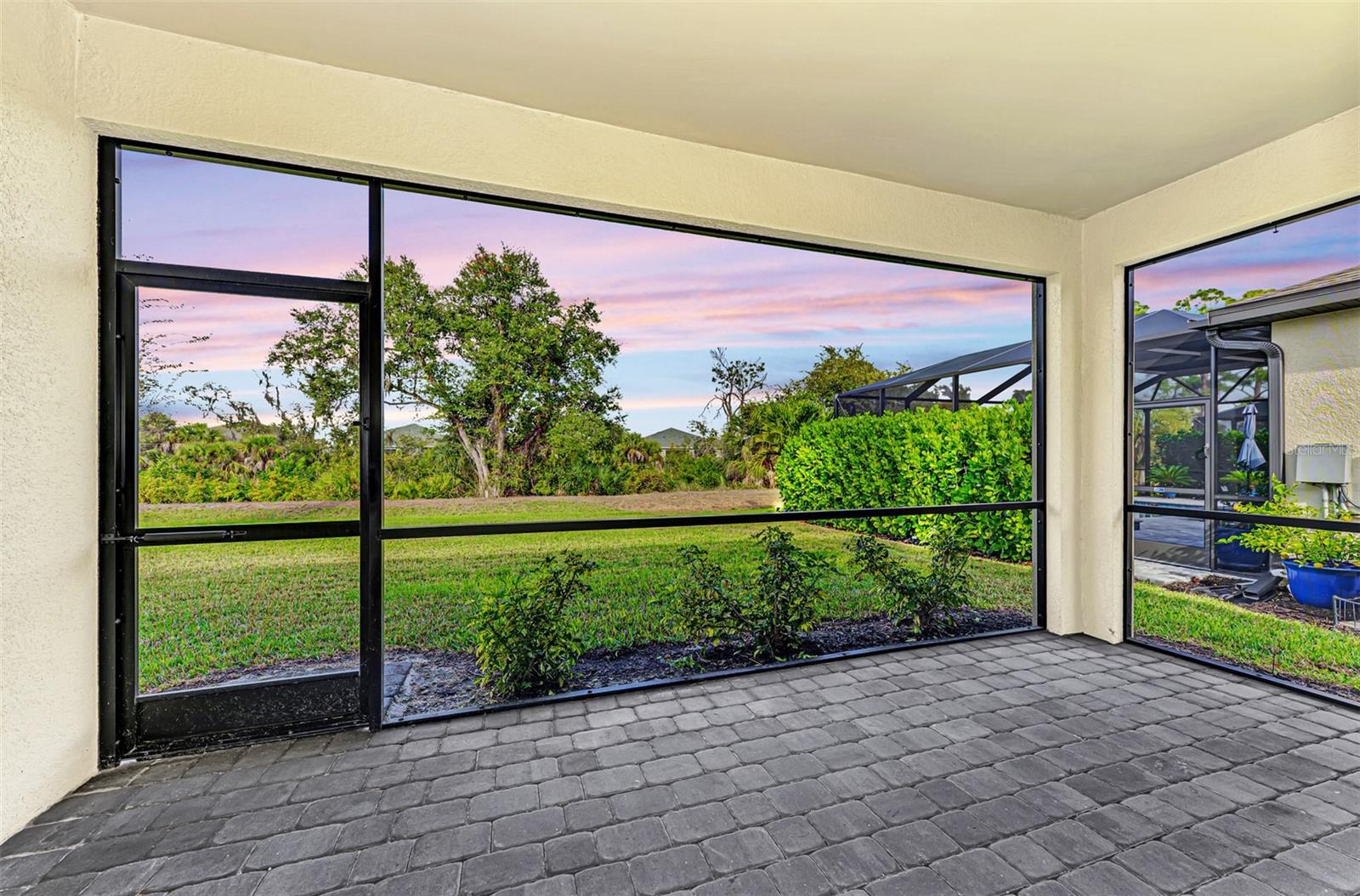 Greenbelt views from your morning coffee spot. - 1932 W ISLES RD, PORT CHARLOTTE