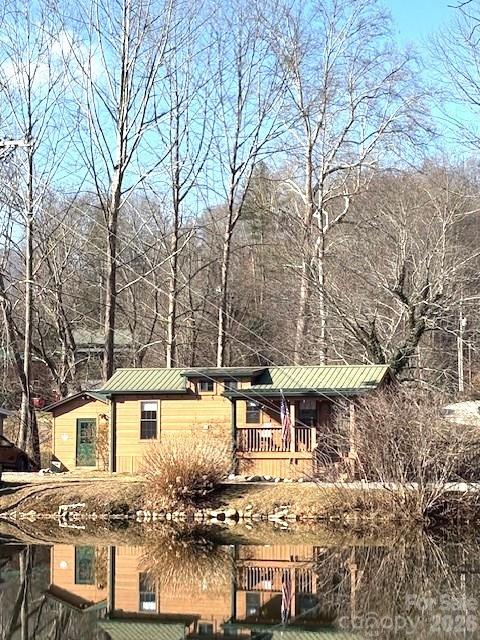 home as seen from across the lake - 129 Mallard Loop, Waynesville