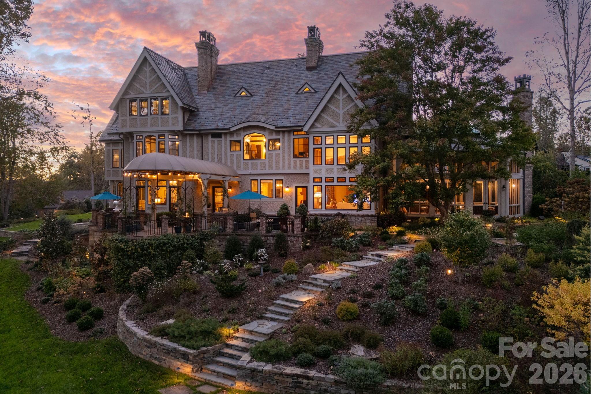 Gracefully sited above the golf course. Wonderful patio to relax and watch the golfers play. - 8 Fairway Place, Asheville