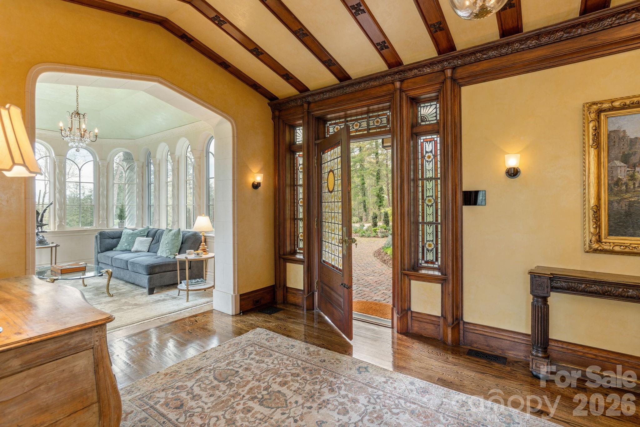 Grand foyer opening to Edwardian sunroom - 8 Fairway Place, Asheville