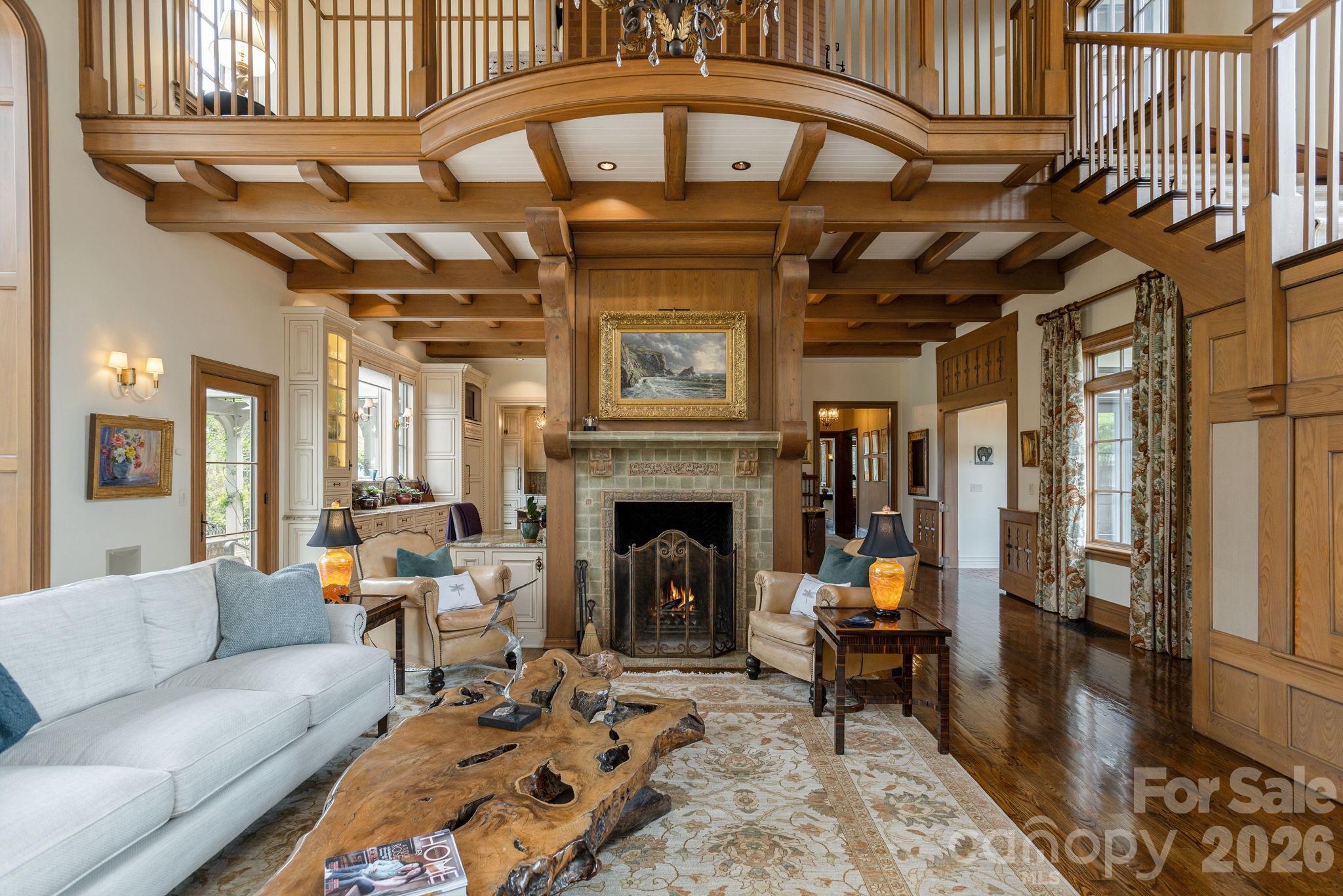 Soaring great hall anchored by a handcrafted stone fireplace - 8 Fairway Place, Asheville