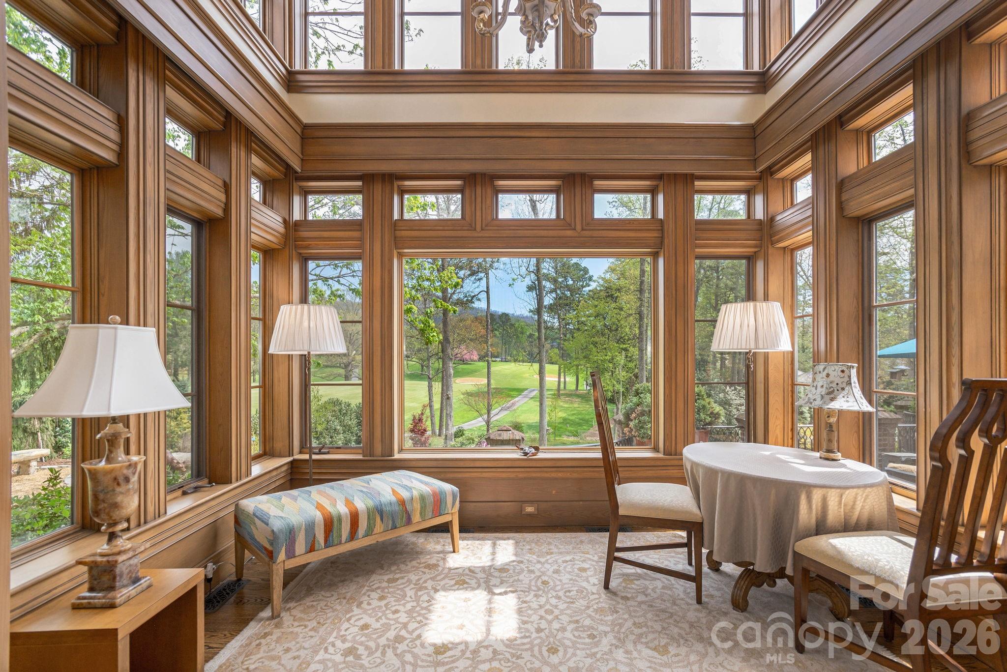 Two-story atrium with panoramic golf course view. Very peaceful sitting area off of the living room - 8 Fairway Place, Asheville