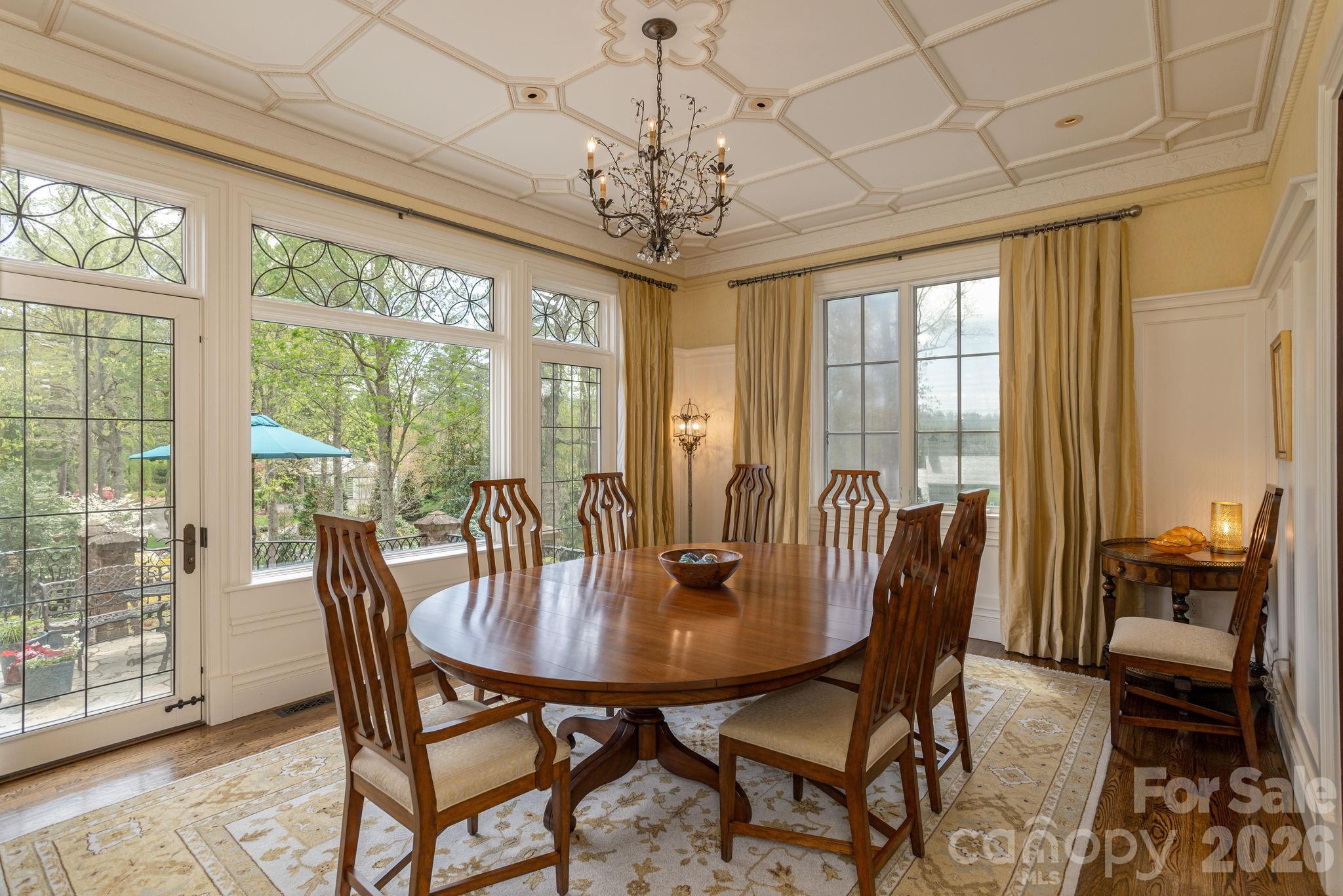 Formal dining room opening to the expansive terrace - 8 Fairway Place, Asheville
