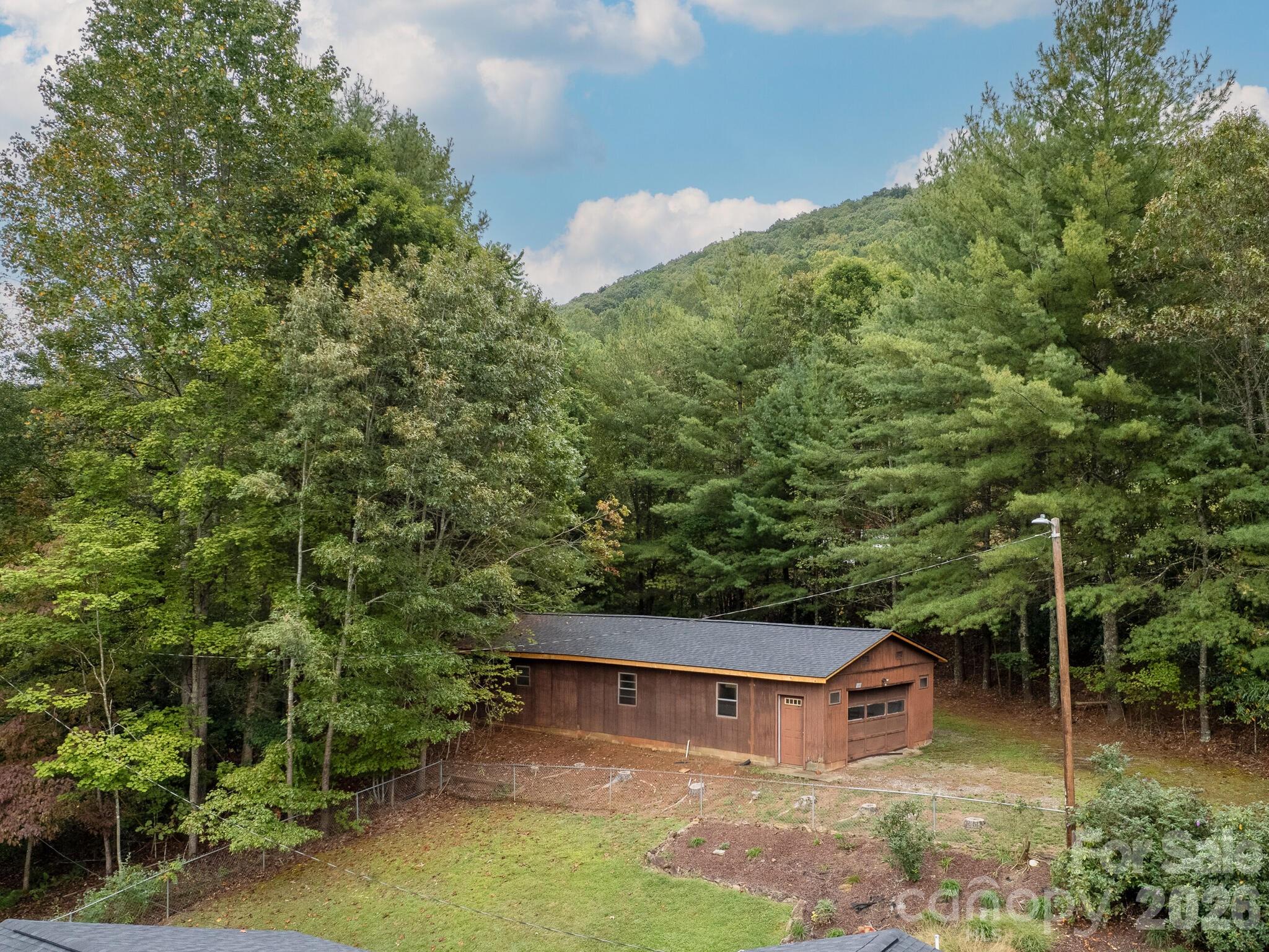 Single Family Residence at 651 Case Cove Road, Candler, photo 38 of 47