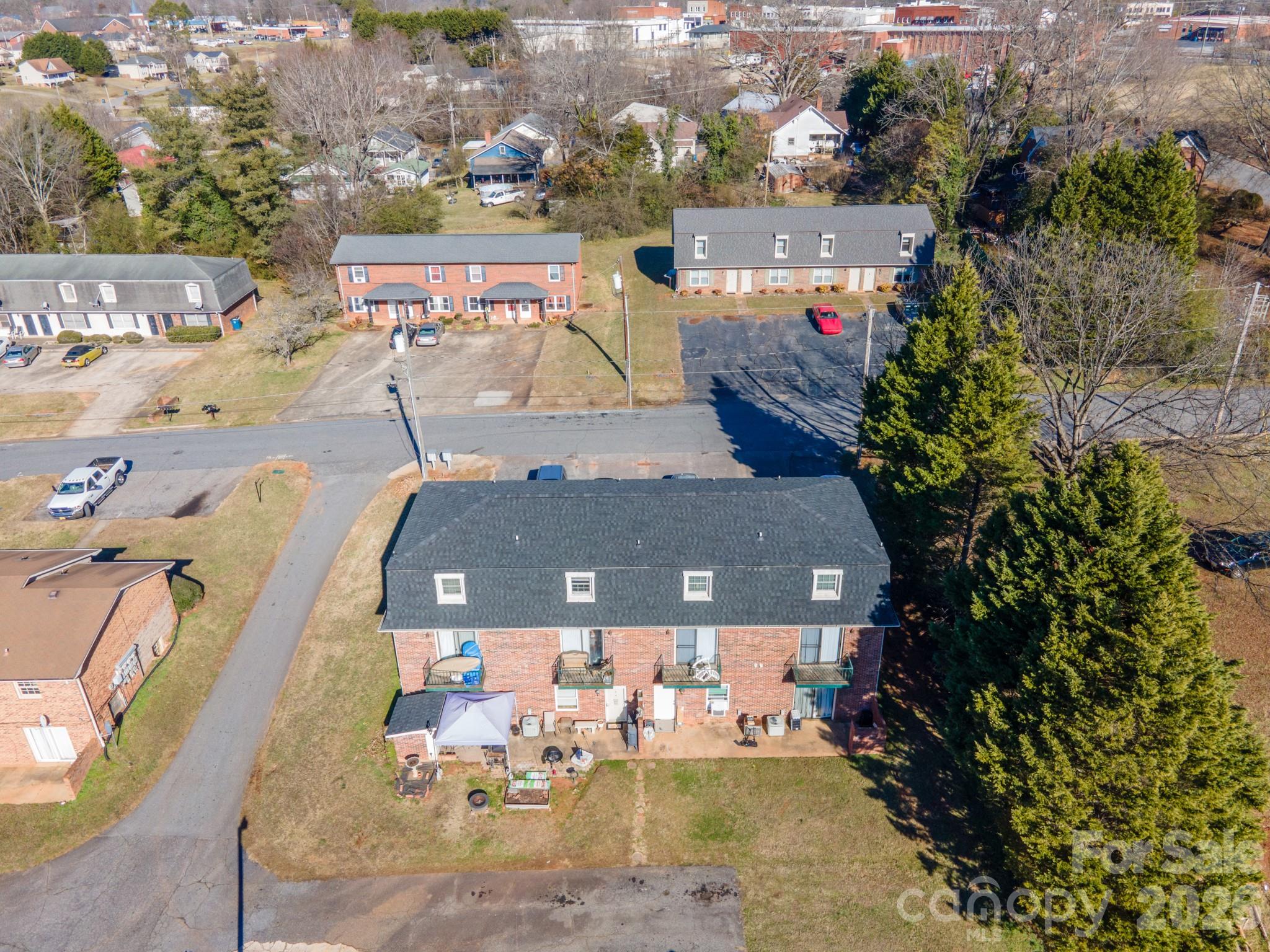 Back of Upper Building - Two Basement Apartments with 2 Bedrooms and 1 Full Bath - 18 Berkley Avenue, Granite Falls