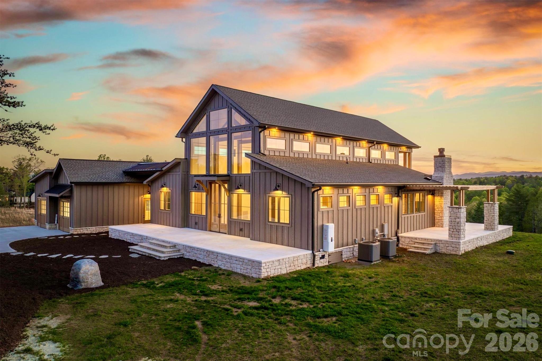 2 story windows and 10' French doors flood the open floor plan with natural light - 2013 Hitching Post Trail, Lenoir