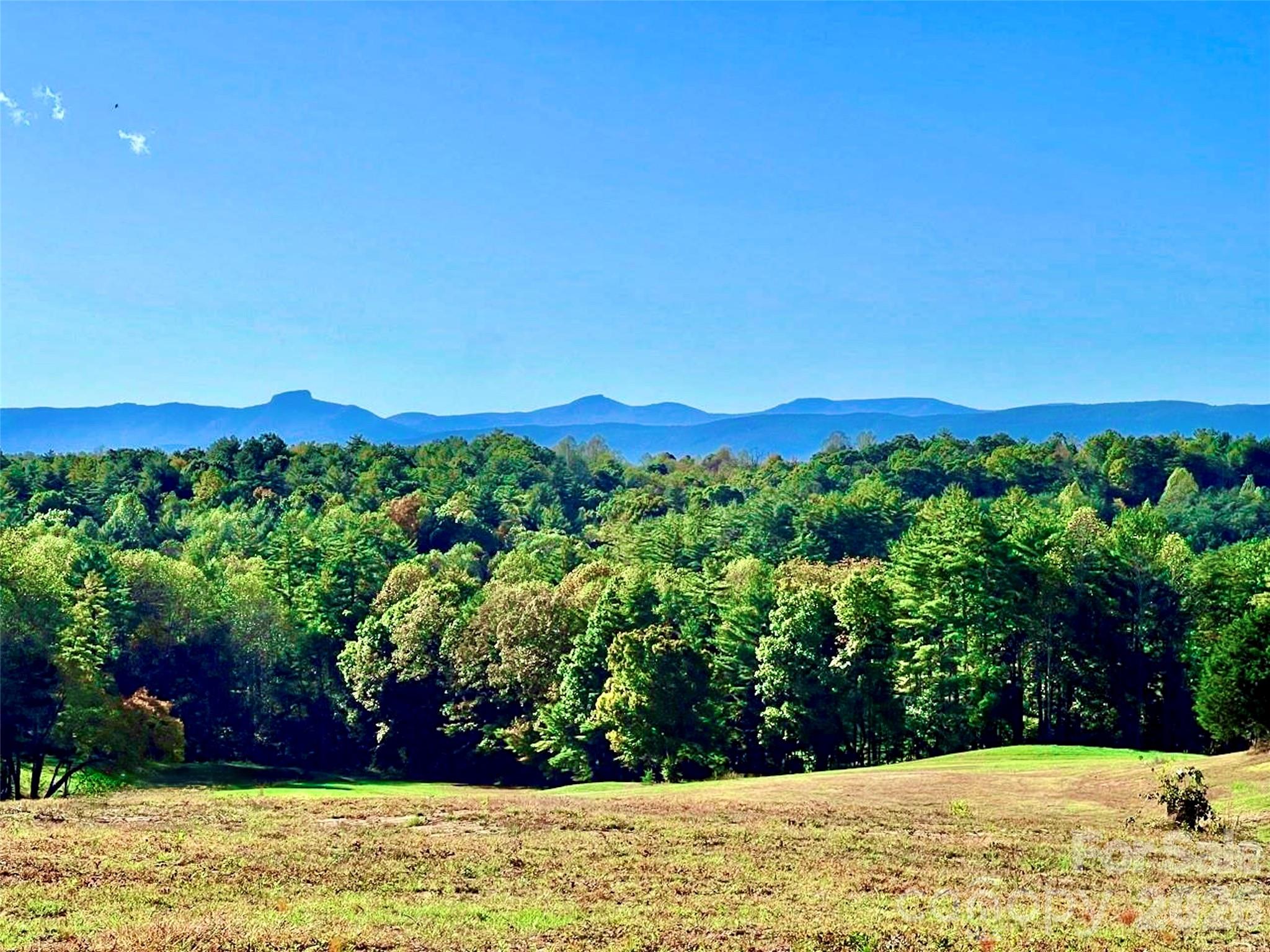 Views like no other...Table Rock, Mt. Mitchell, Brown Mountain, Hawks Bill, Grandfather Mountain, the South Mountains, and more. - 2013 Hitching Post Trail, Lenoir
