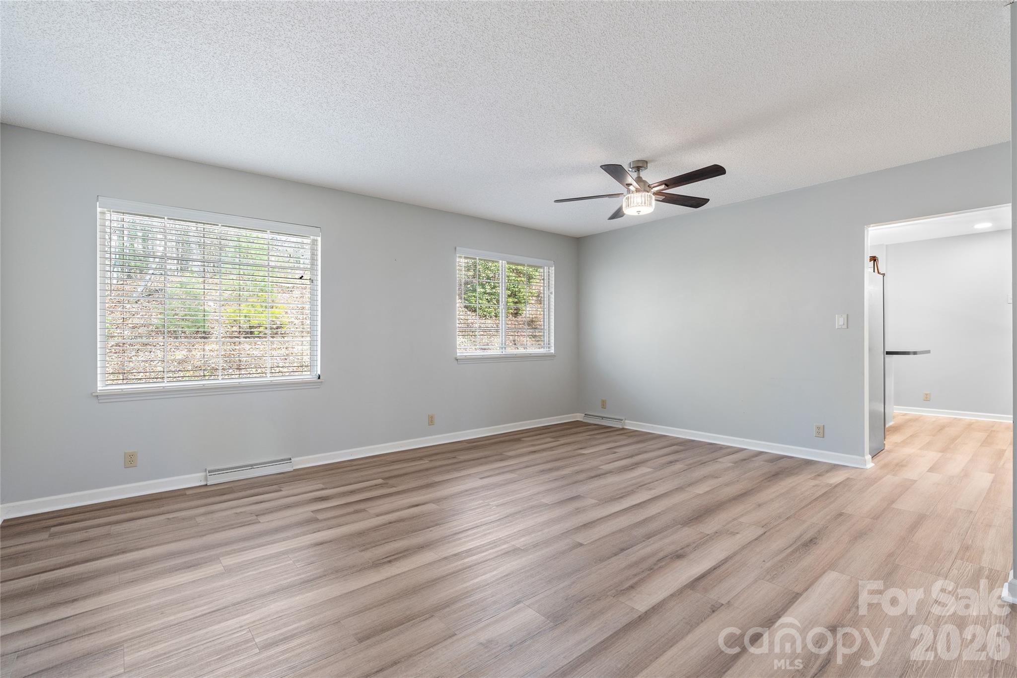 Living room into Kitchen - 177 Country Road, Brevard
