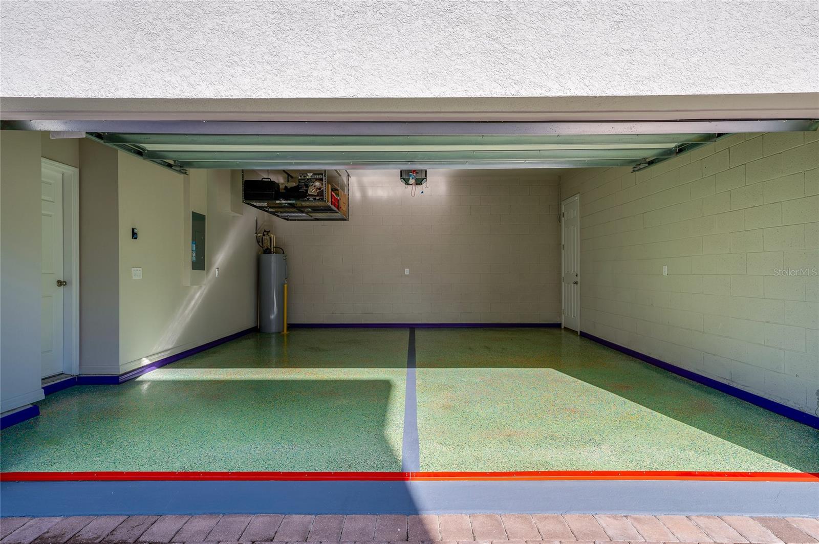 Garage with Epoxy Floor - 2912 MELETO BLVD, NEW SMYRNA BEACH