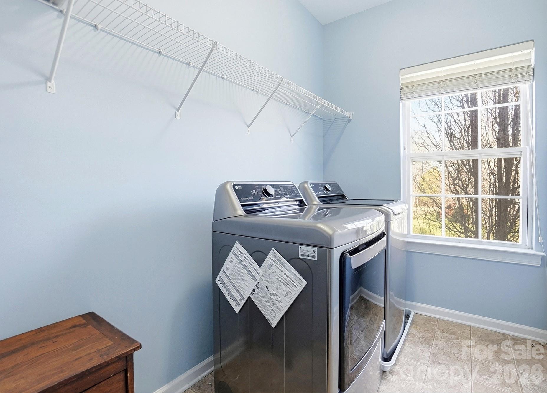 Large Laundry Room with closet - 5008 Rosewater Lane, Indian Trail