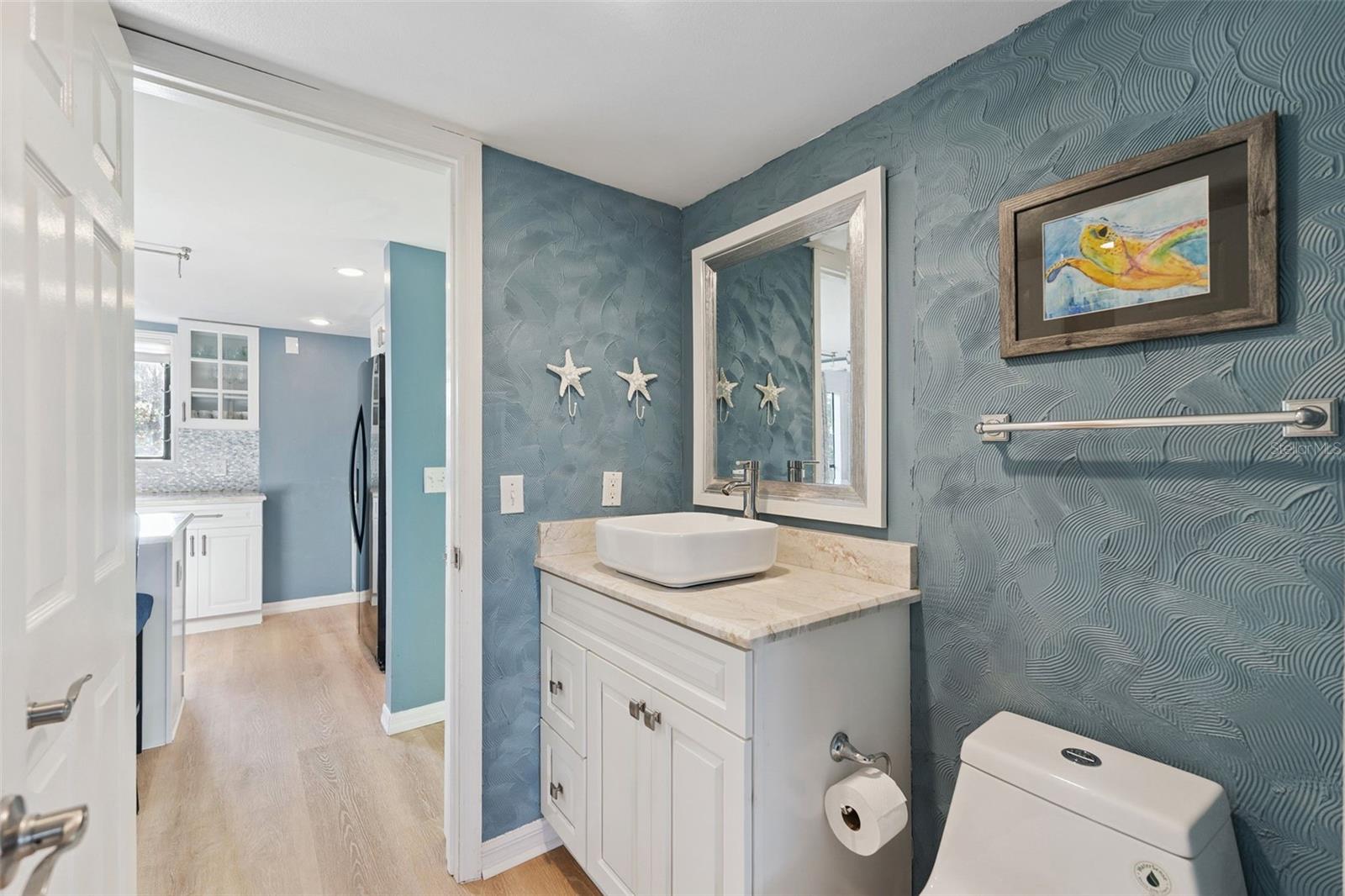 En suite and guest bathroom combo. Bath with shower across from vanity - 6455 ENGRAM RD, NEW SMYRNA BEACH