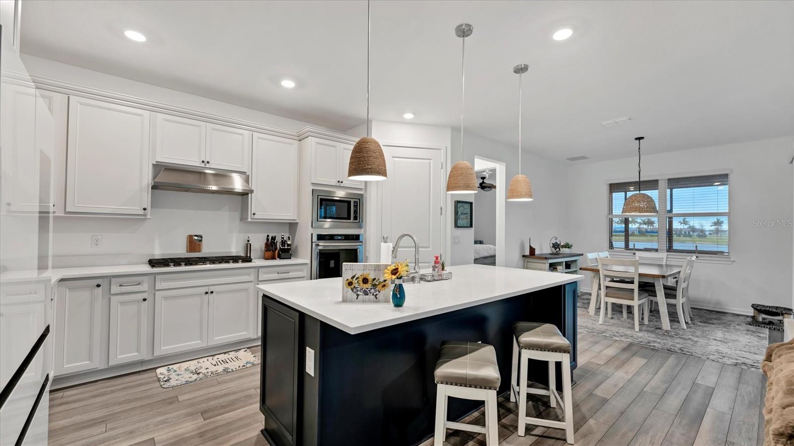 Two tone kitchen cabinetries, wall oven and microwave and you are cooking with GAS - 8705 COASTAL KEY WAY, PARRISH
