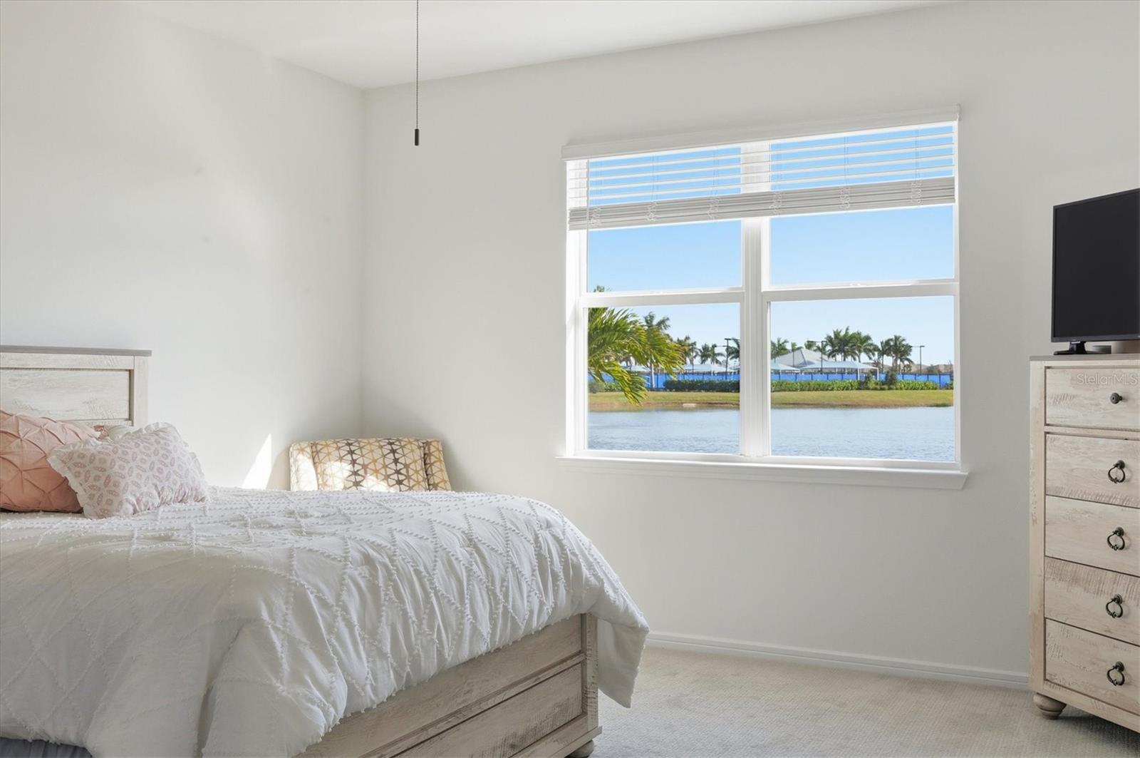 Primary bedroom presents big water views... - 8705 COASTAL KEY WAY, PARRISH