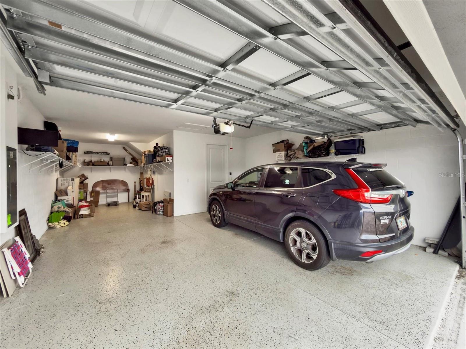Two car garage with tandem or storage space = 3 cars or 2 cars and a golf cart - 8705 COASTAL KEY WAY, PARRISH