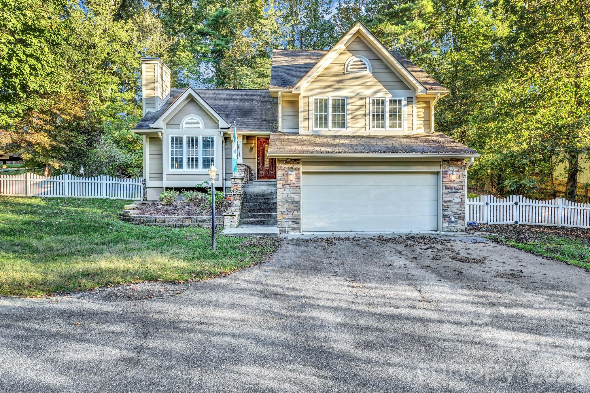Single Family Residence at 911 Fanning Bridge Road, Fletcher, photo 2 of 32