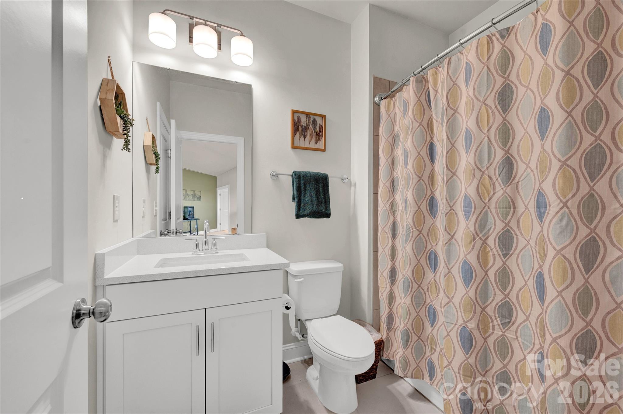 3rd bath on the upper level shared with bonus and bedroom #4 - 309 W Waterlynn Road, Mooresville