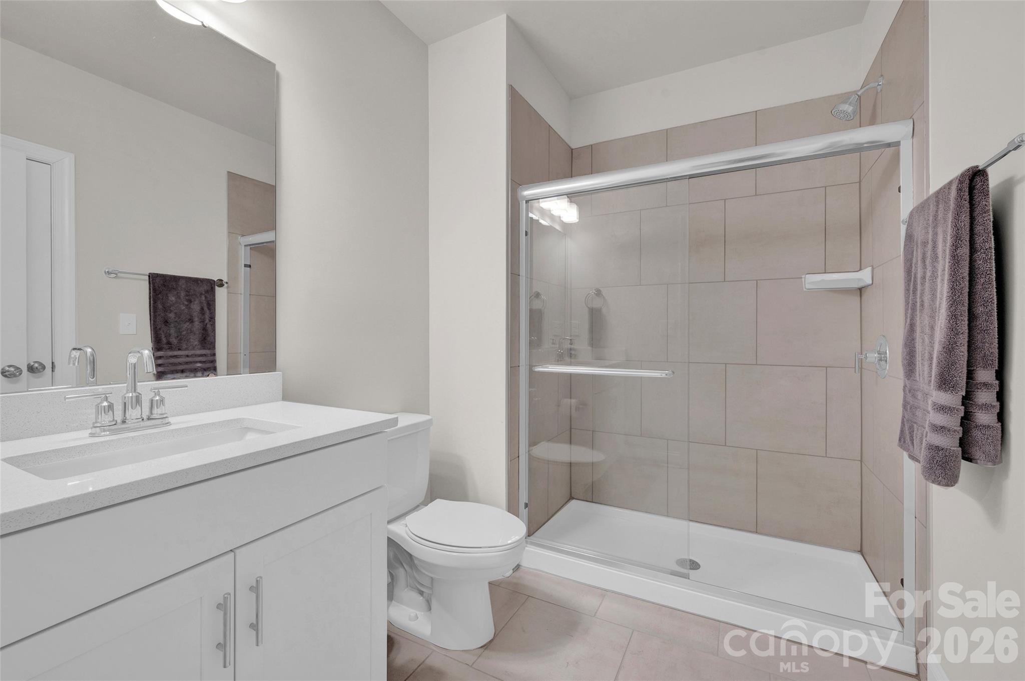 Basement full bath shared with bedroom #6 - 309 W Waterlynn Road, Mooresville