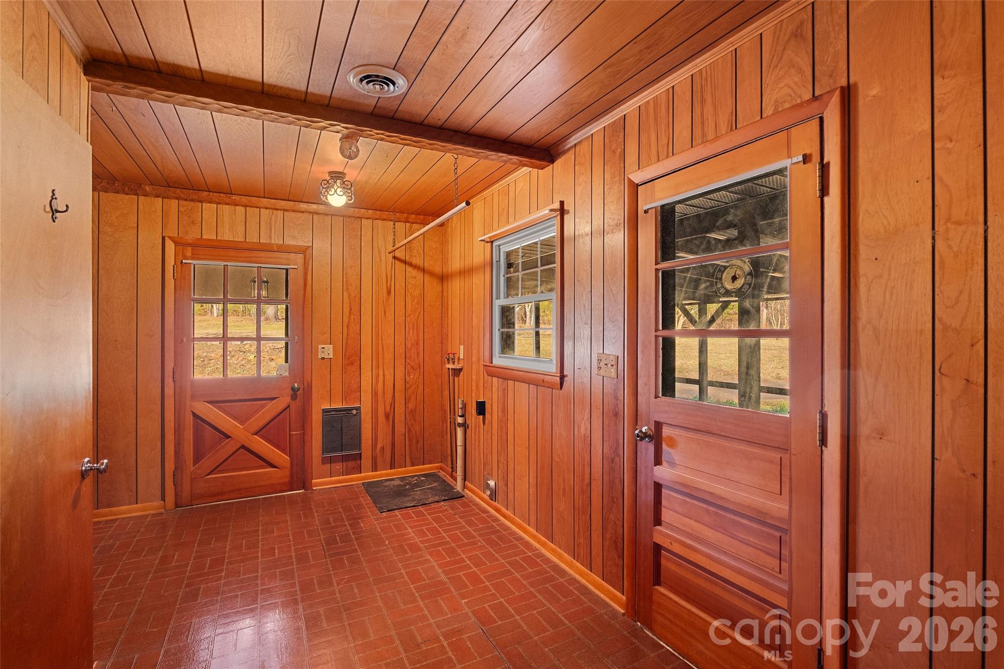 Laundry room is pretty expansive. Built in shelving is recessed to the left - 591 Landrum Road, Columbus