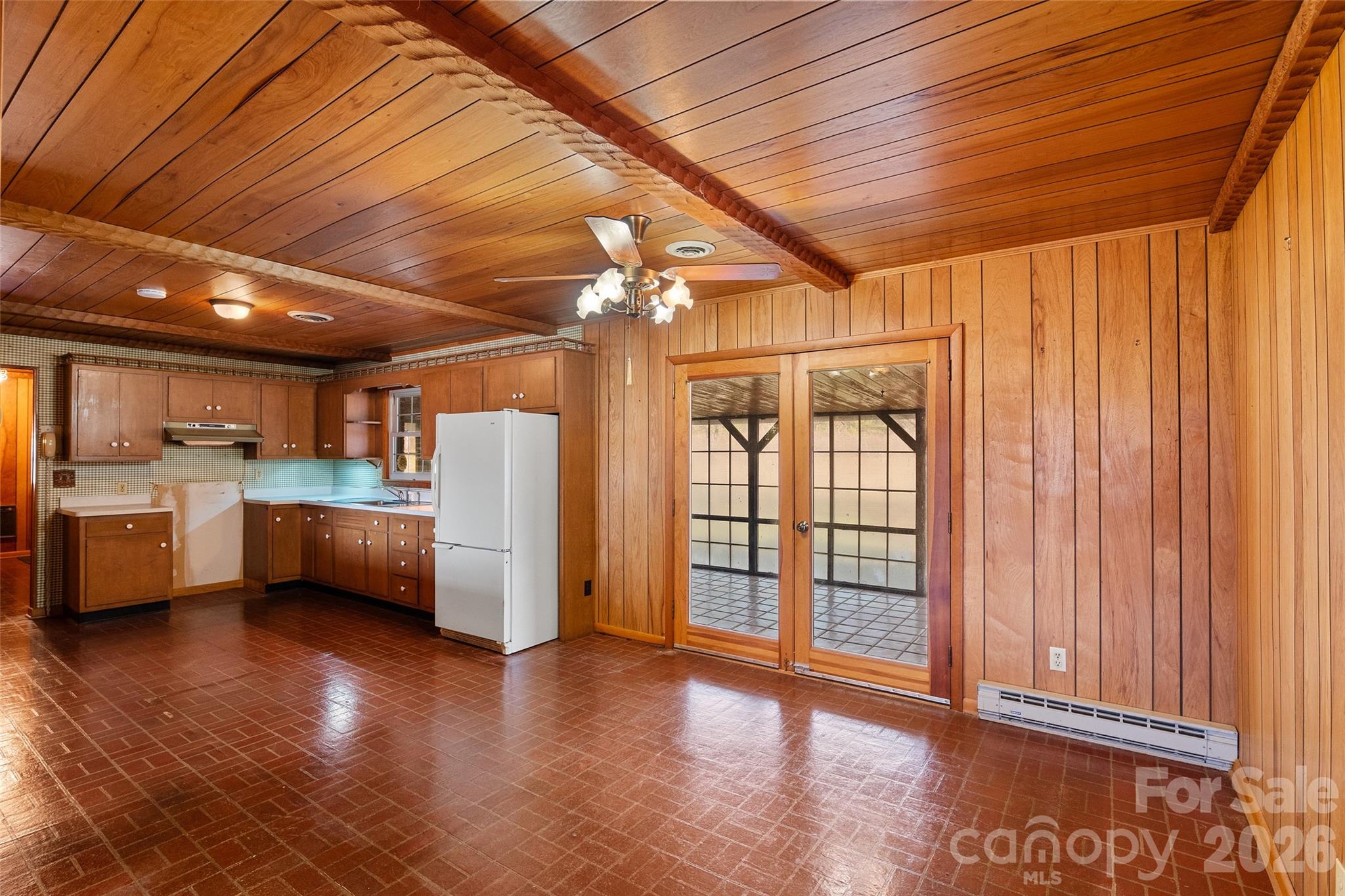 Dining area view from front entry. French doors lead to expansive screened porch - 591 Landrum Road, Columbus