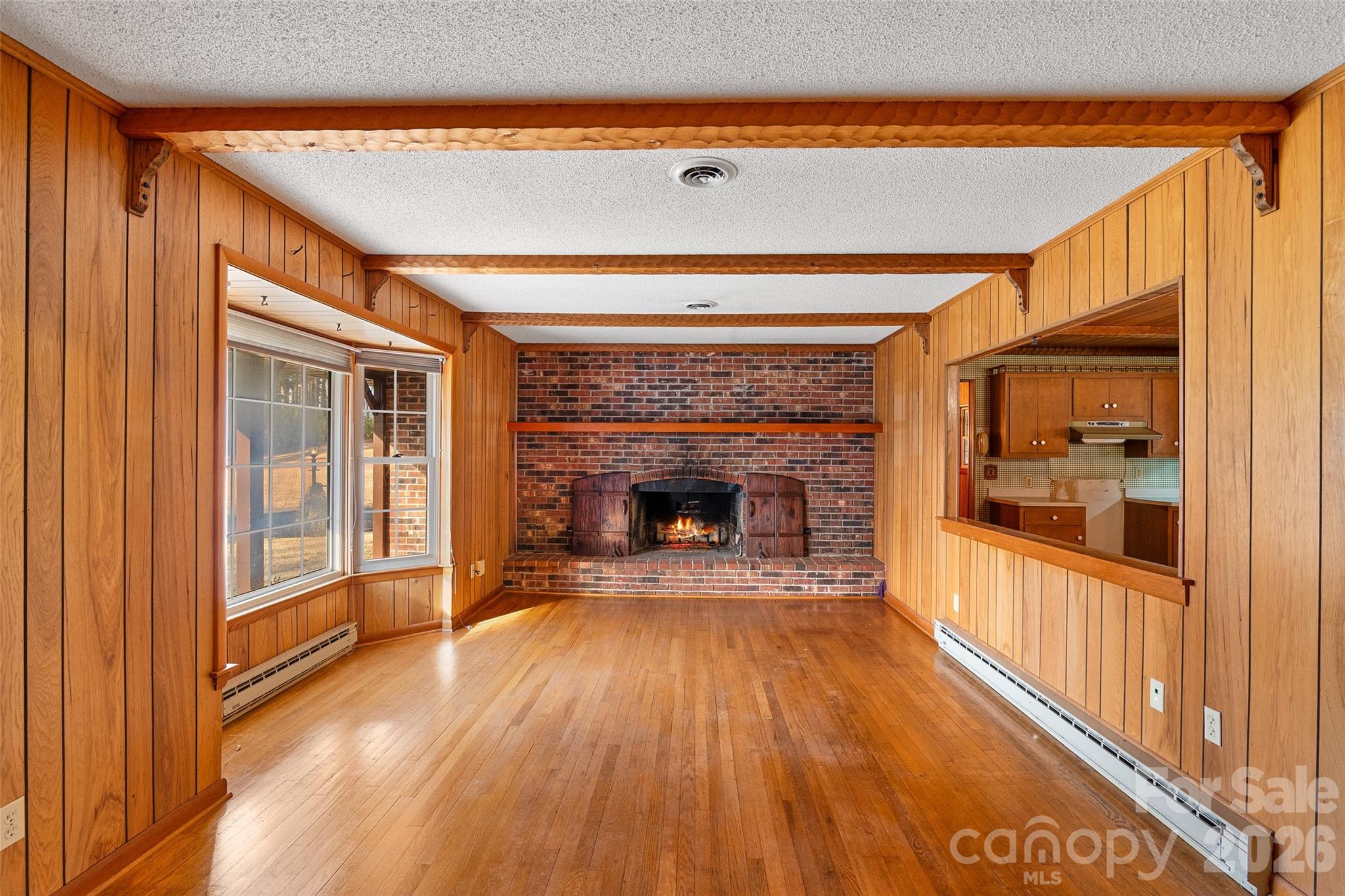 Use your imagination as to what you can create! Beautiful fireplace (needs re-pointed), oak wood floors and wood beamed ceiling! - 591 Landrum Road, Columbus