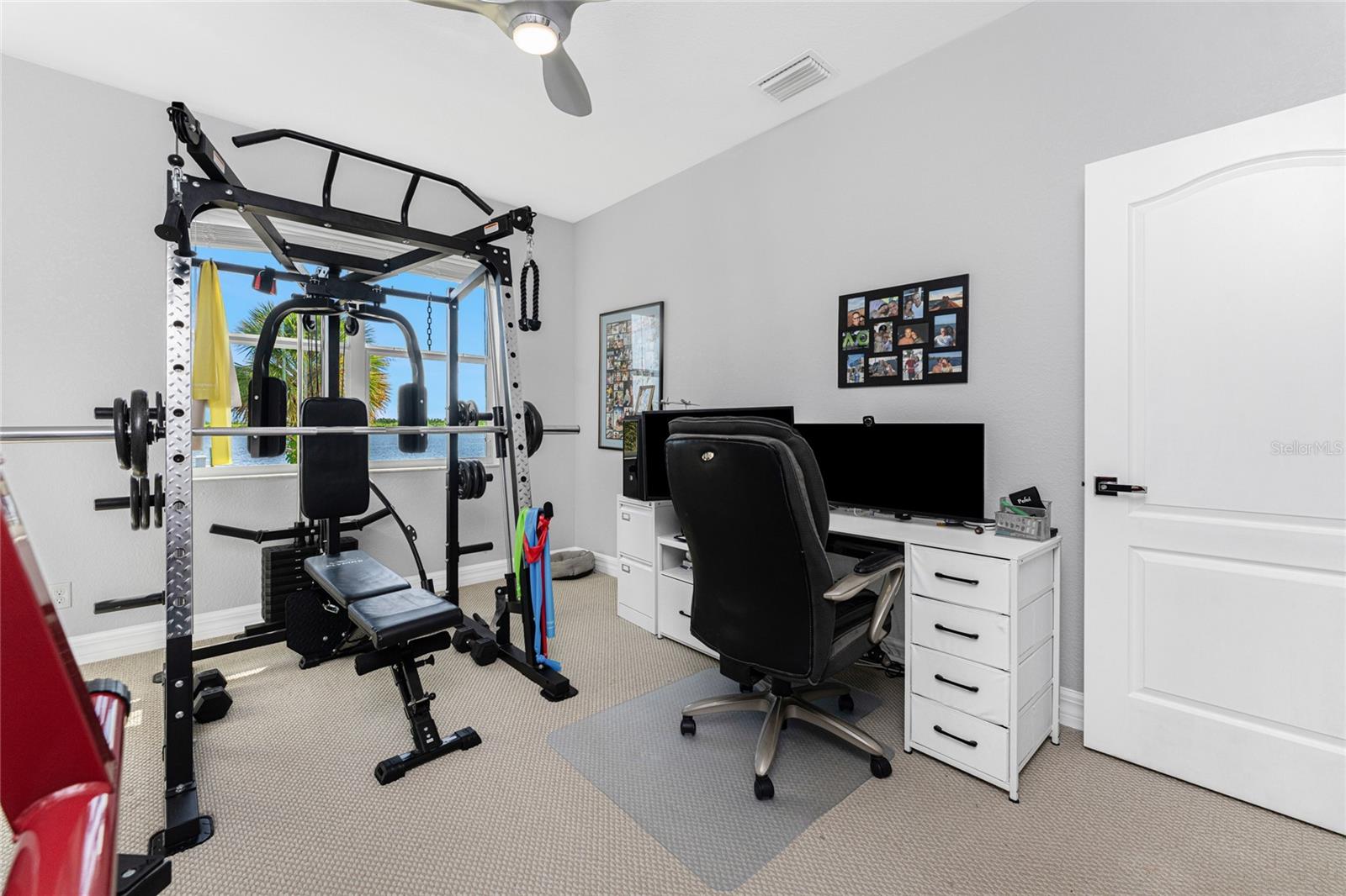 Enjoy the wide water views as you work or workout. - 16168 LA BARGE CIR, PORT CHARLOTTE