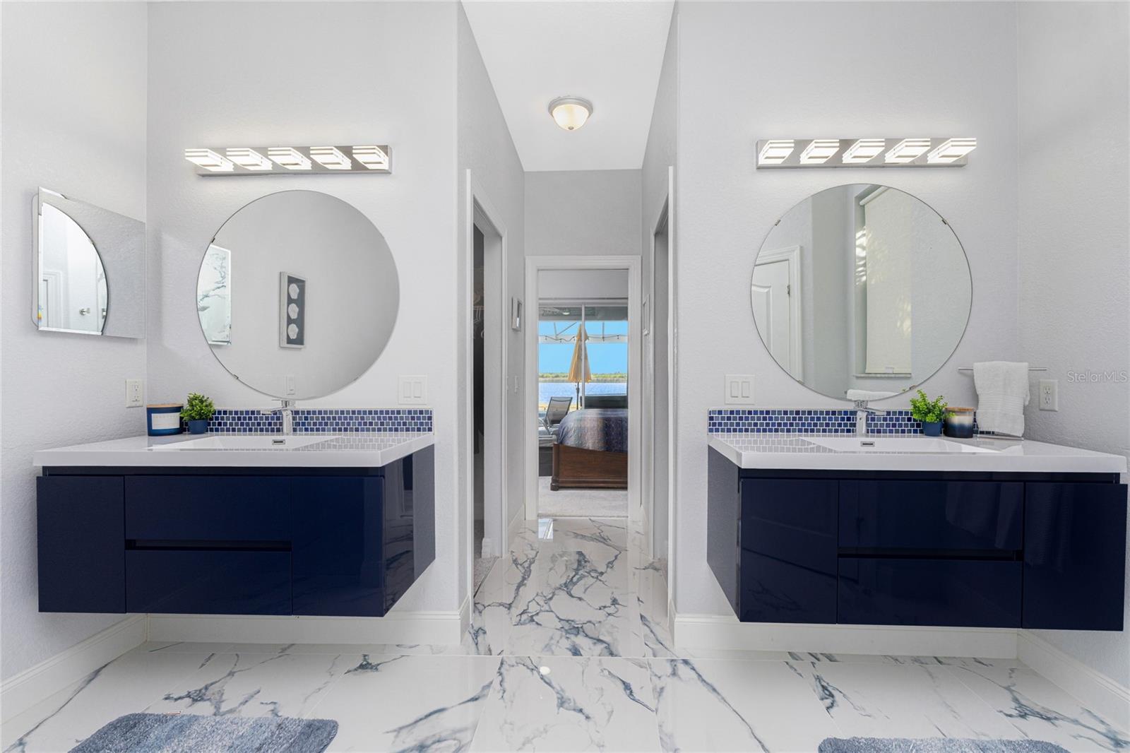 His and Hers wall hung vanities. - 16168 LA BARGE CIR, PORT CHARLOTTE