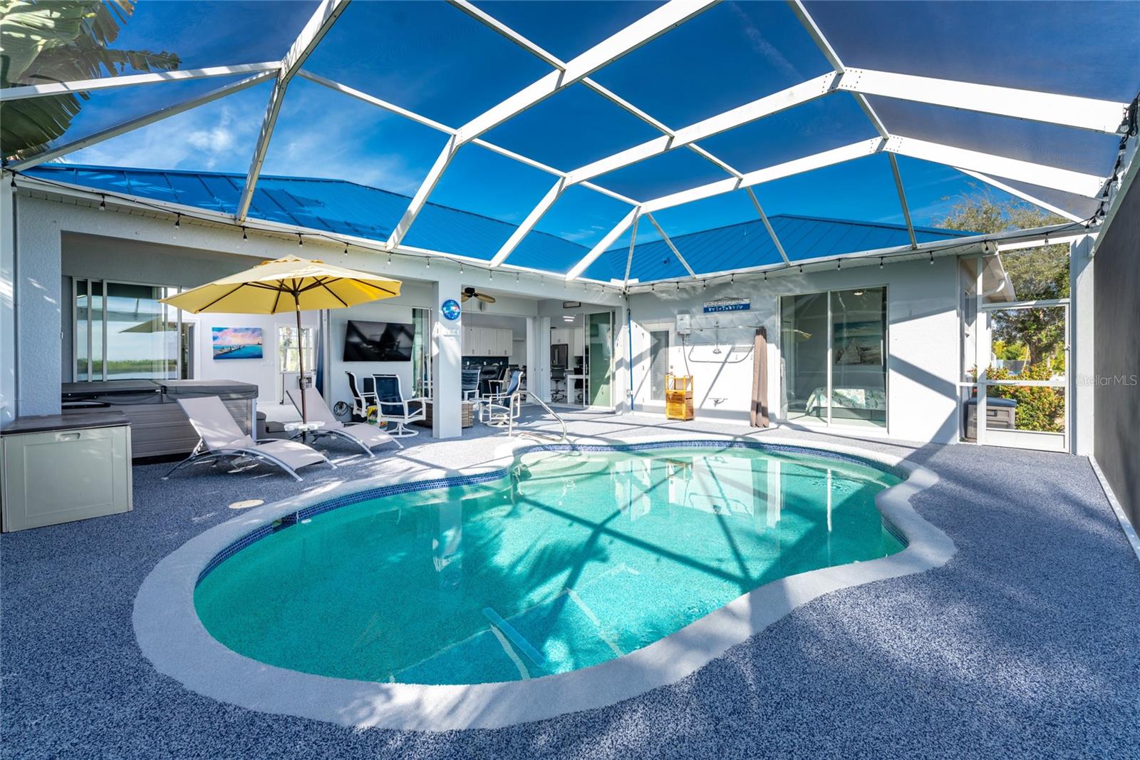 New EPDM rubber coated pool deck.  Soft on your feet and won't burn them! - 16168 LA BARGE CIR, PORT CHARLOTTE