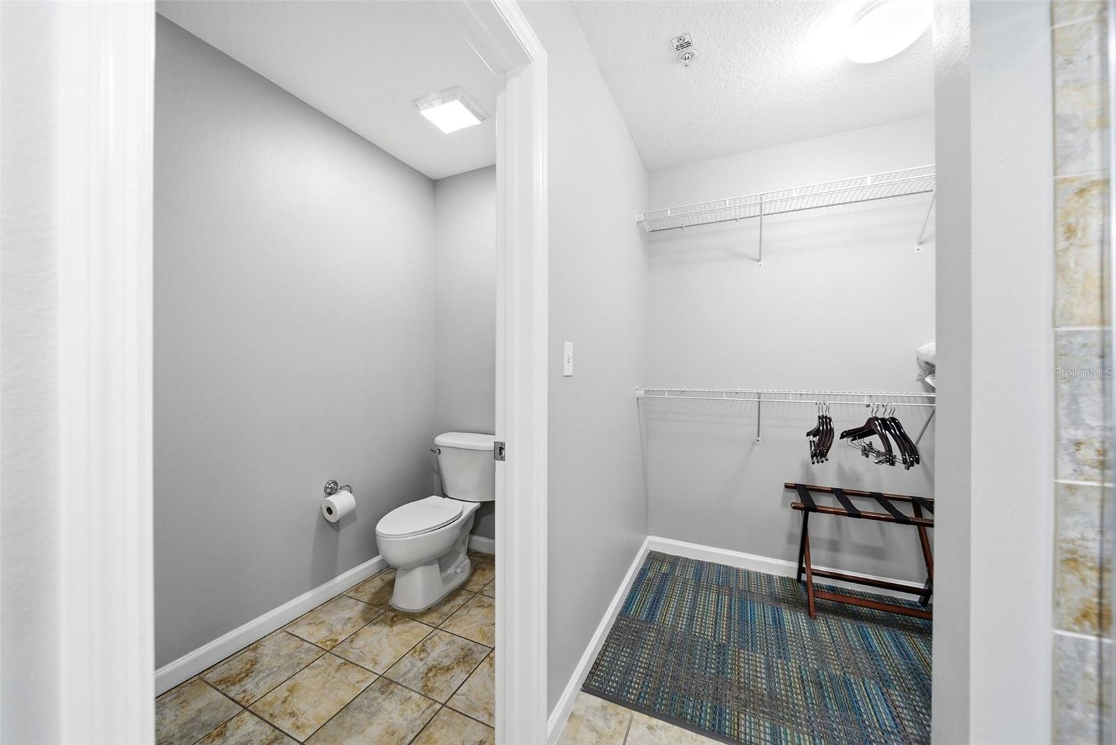 Bathroom 2 private toilet and walk-in closet - 14501 GROVE RESORT AVE #1705, WINTER GARDEN
