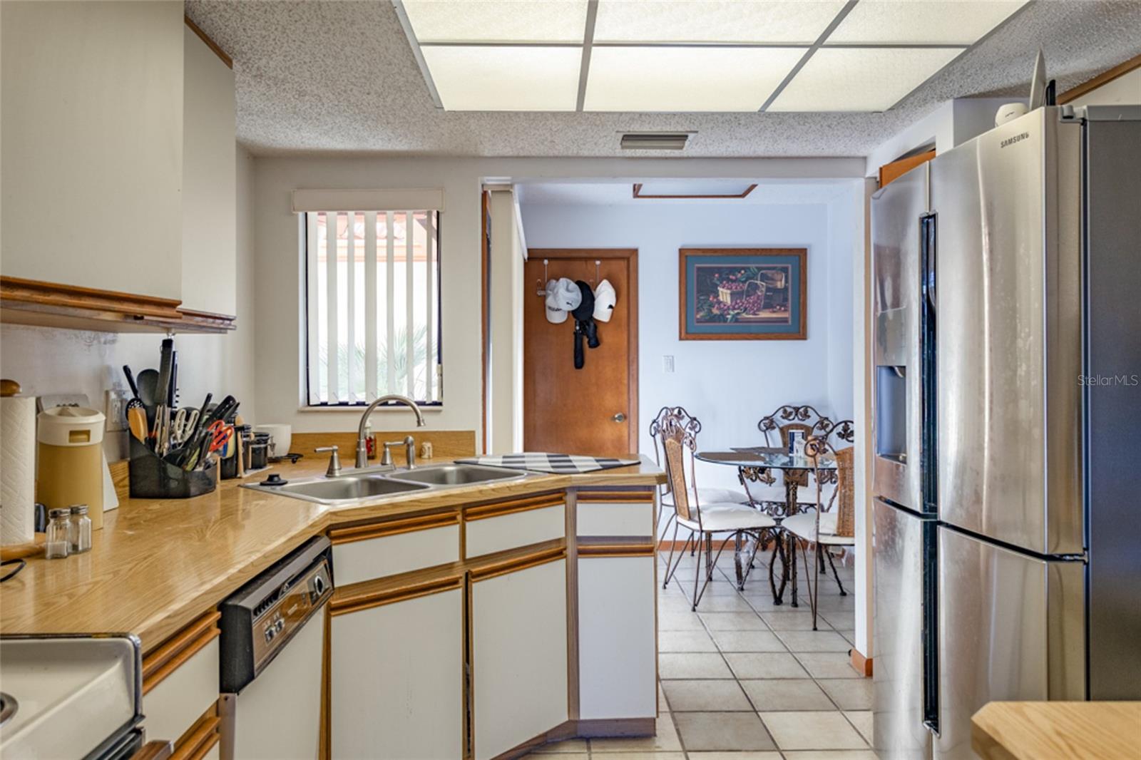 Kitchen and eat in area - 39 VILLAGE CIR #5-501, PALM COAST