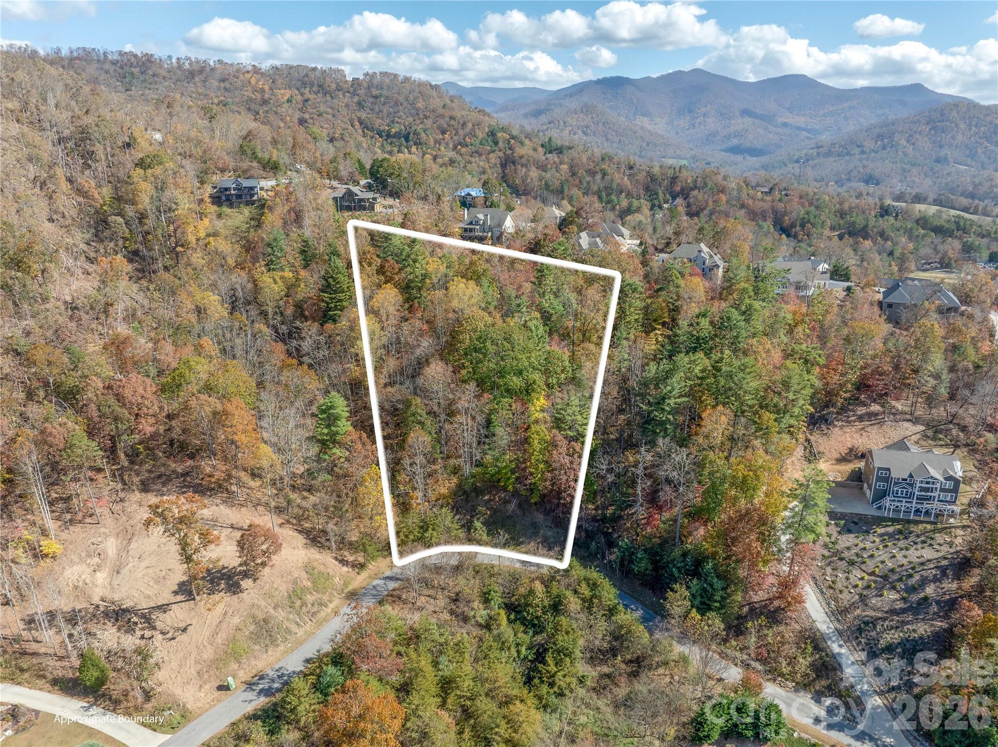 A second approximate Lot line overlay - Not a survey - Neighbors lot being cleared for building to the left - Home now completed - Top of the lot is High Bluff Ridge - drive up to see the views. - 66 HawTree Court, Weaverville