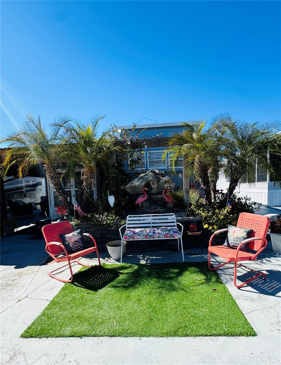 Enjoy your coffee on the front patio! - 411 ST GEORGE DR, DAVENPORT