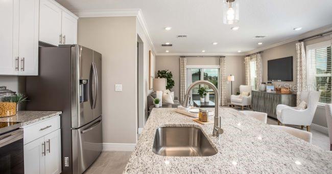 Model home - actual features may vary. - 57 ENCLAVE AVE, PALM COAST