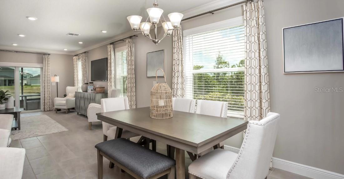 Model home - actual features may vary. - 57 ENCLAVE AVE, PALM COAST
