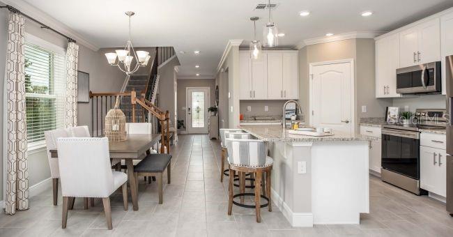 Model home - actual features may vary. - 57 ENCLAVE AVE, PALM COAST