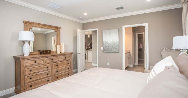 Model home - actual features may vary. - 57 ENCLAVE AVE, PALM COAST