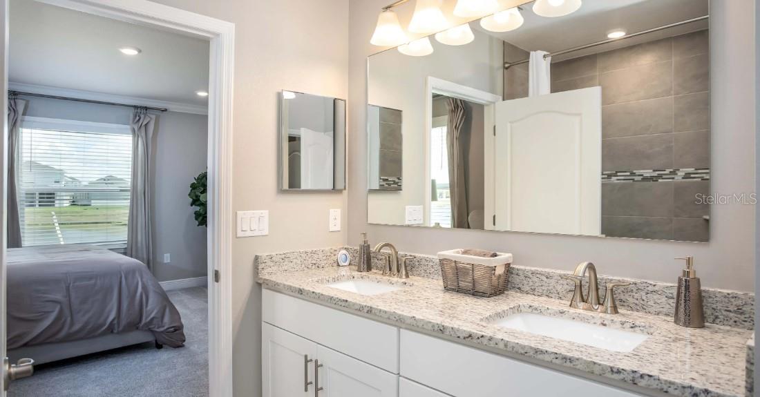 Model home - actual features may vary. - 57 ENCLAVE AVE, PALM COAST