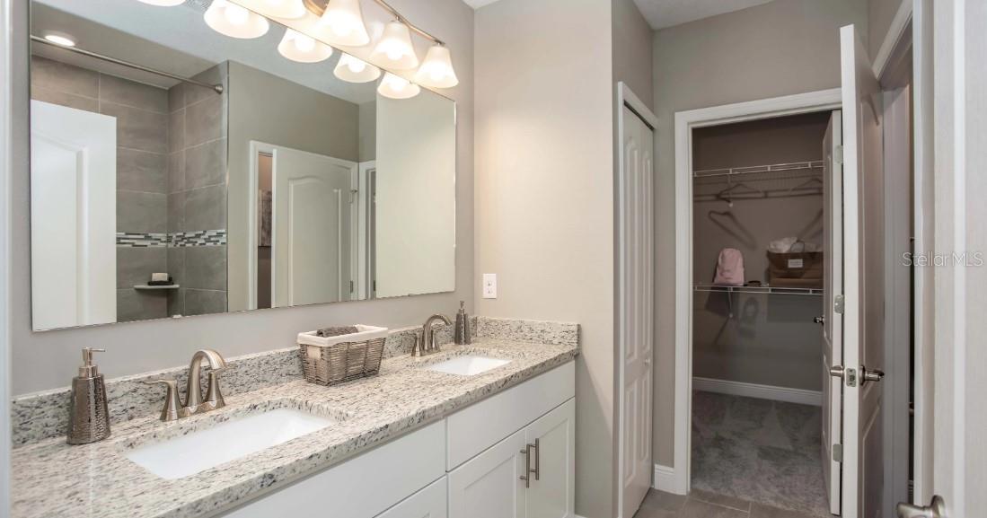 Model home - actual features may vary. - 57 ENCLAVE AVE, PALM COAST