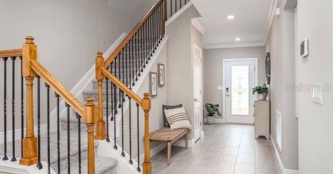 Model home - actual features may vary. - 57 ENCLAVE AVE, PALM COAST